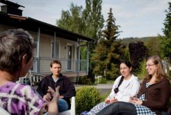 students talking outside